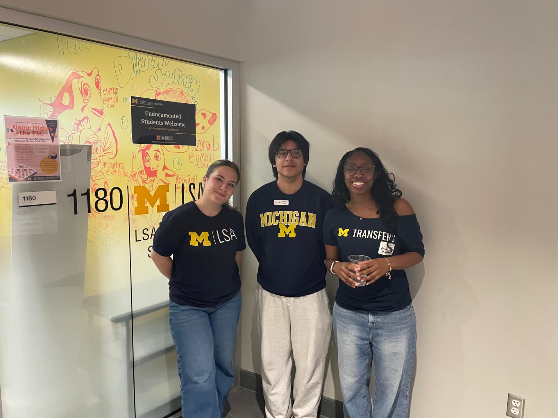 Sky and two student team members at the Transfer Student Center